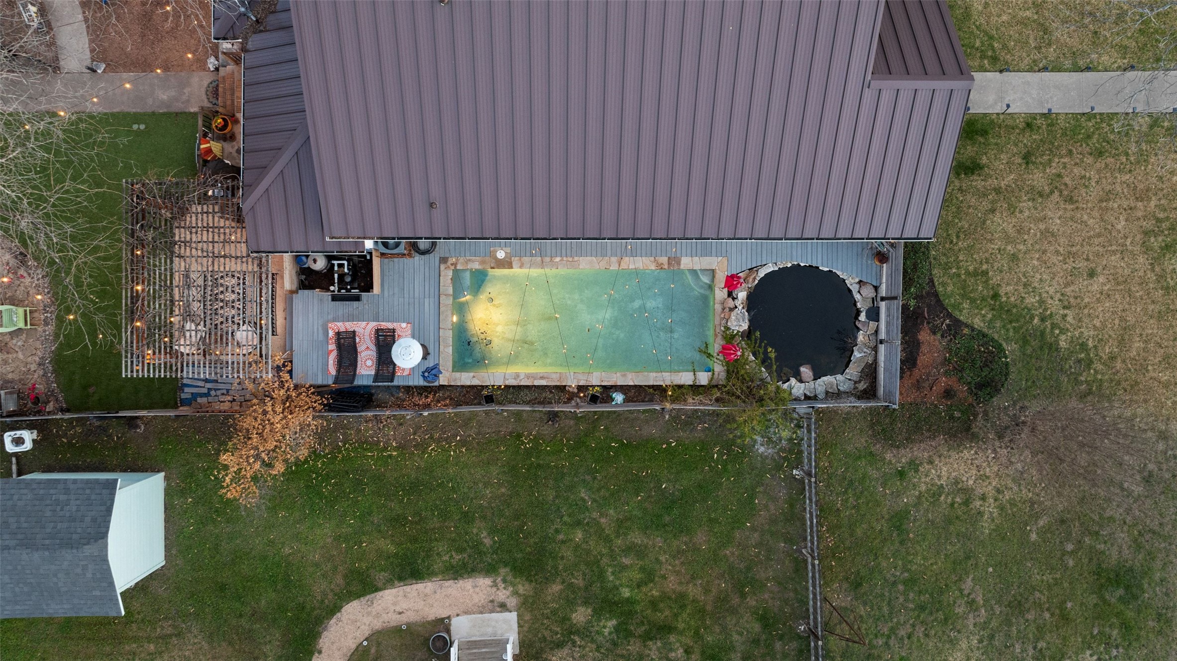 1507 South Church Street Georgetown, TX 78626 - Photo 37 of 40 a backyard of a house with table and chairs