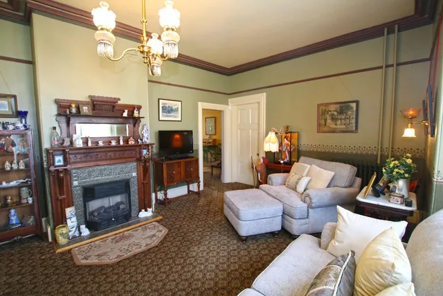a vase of flowers sitting on a table