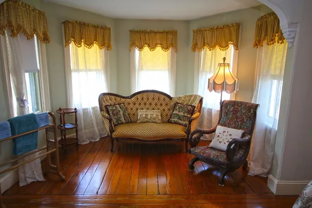 a kitchen with stainless steel appliances a stove microwave and refrigerator