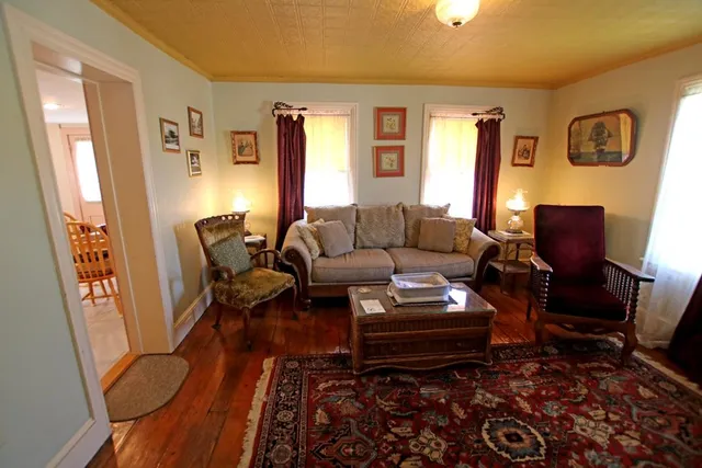 a bedroom with a bed and a lamp