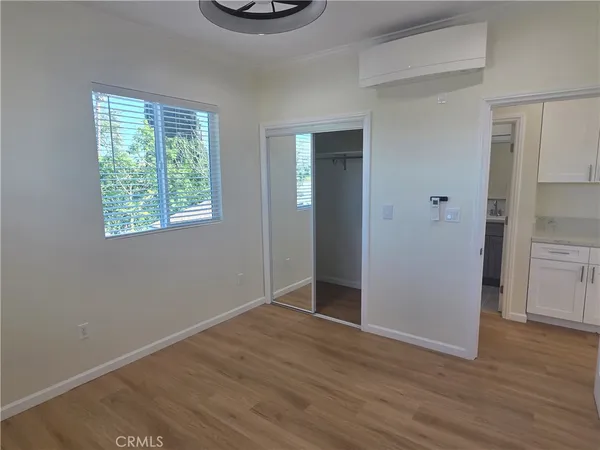 a view of an empty room and window