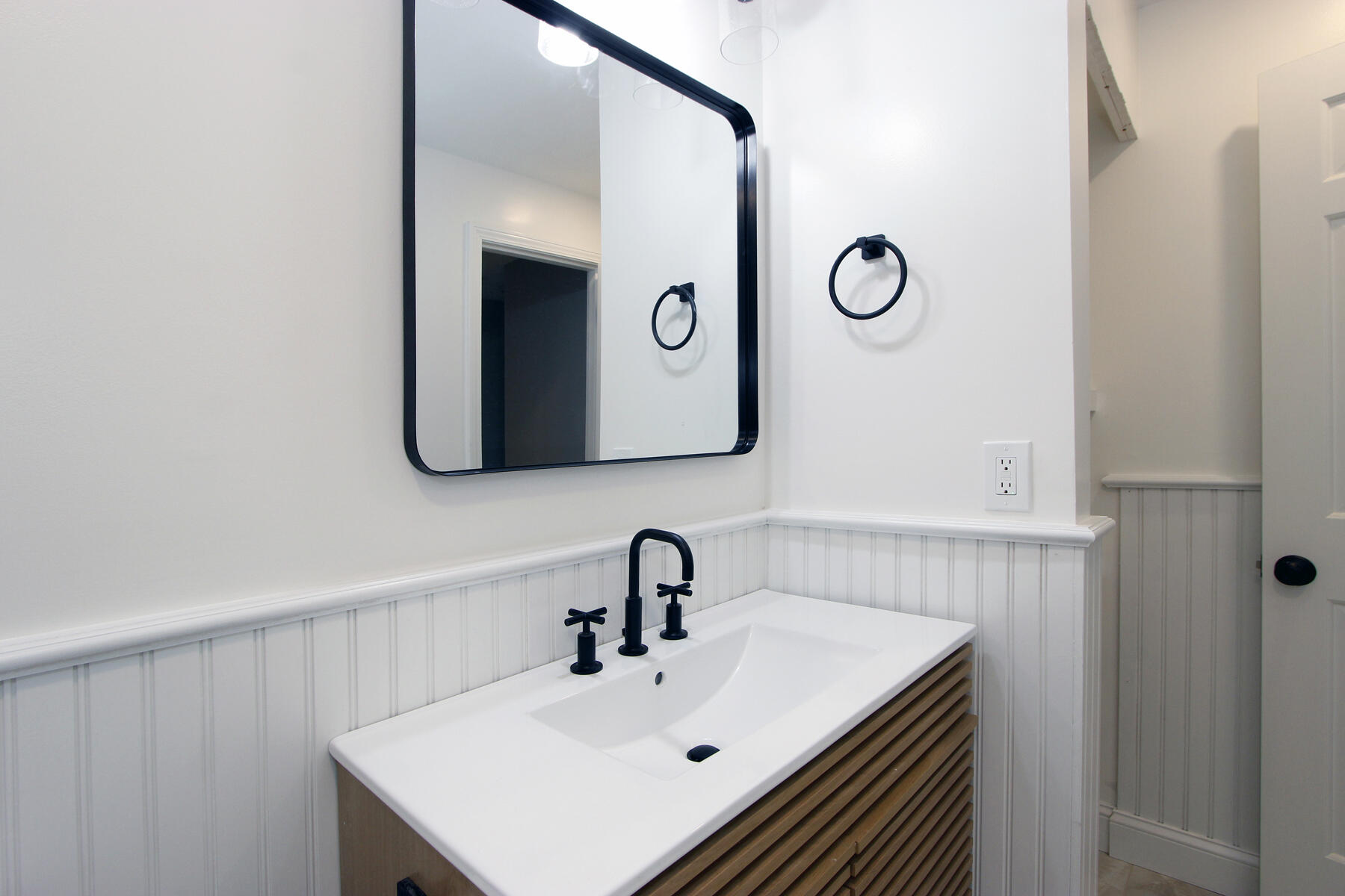 42 Old Colony Way, Unit 30 Orleans, MA 02653 - Photo 12 of 36 a bathroom with a sink and a mirror