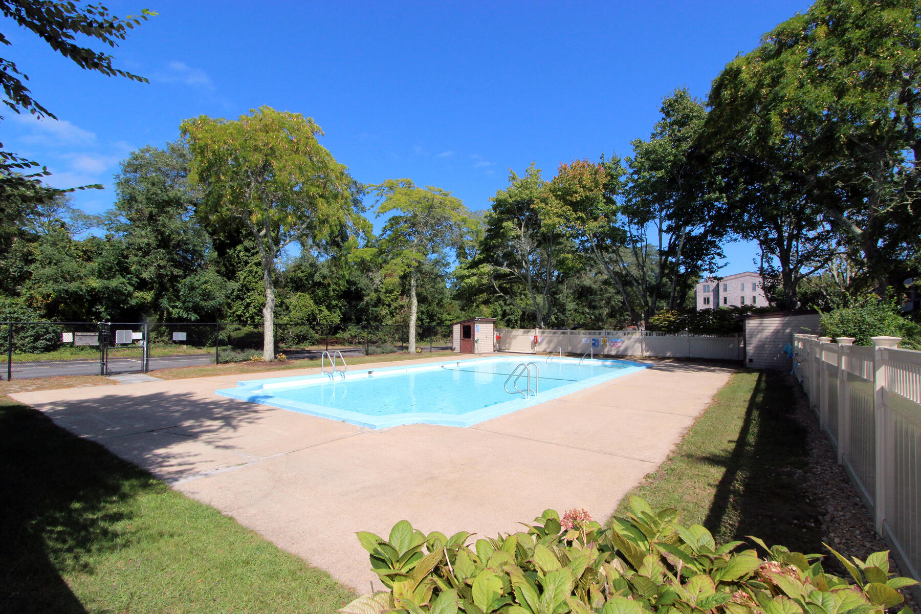 42 Old Colony Way, Unit 30 Orleans, MA 02653 - Photo 22 of 36 a view of a yard with swimming pool