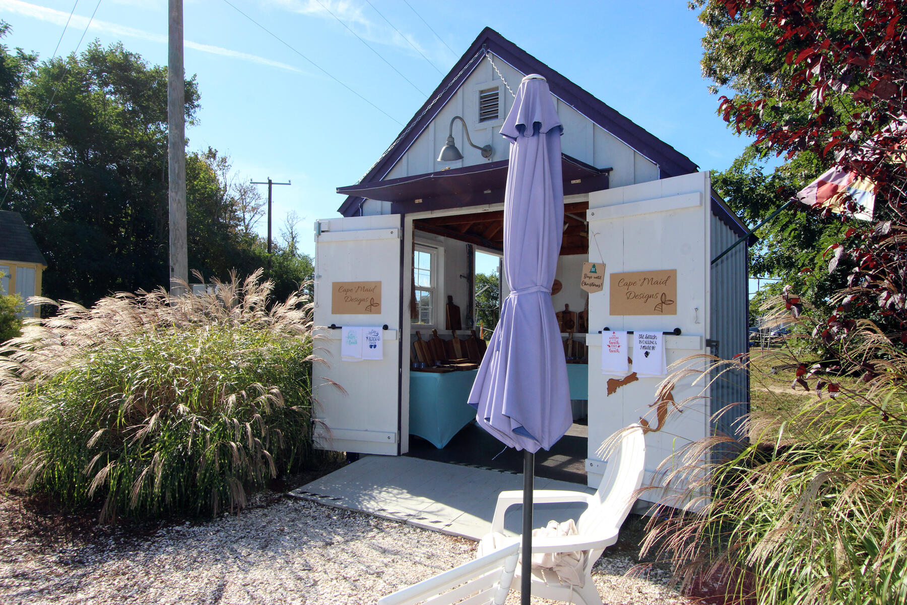 42 Old Colony Way, Unit 30 Orleans, MA 02653 - Photo 30 of 36 a view of a house with a small yard and plants