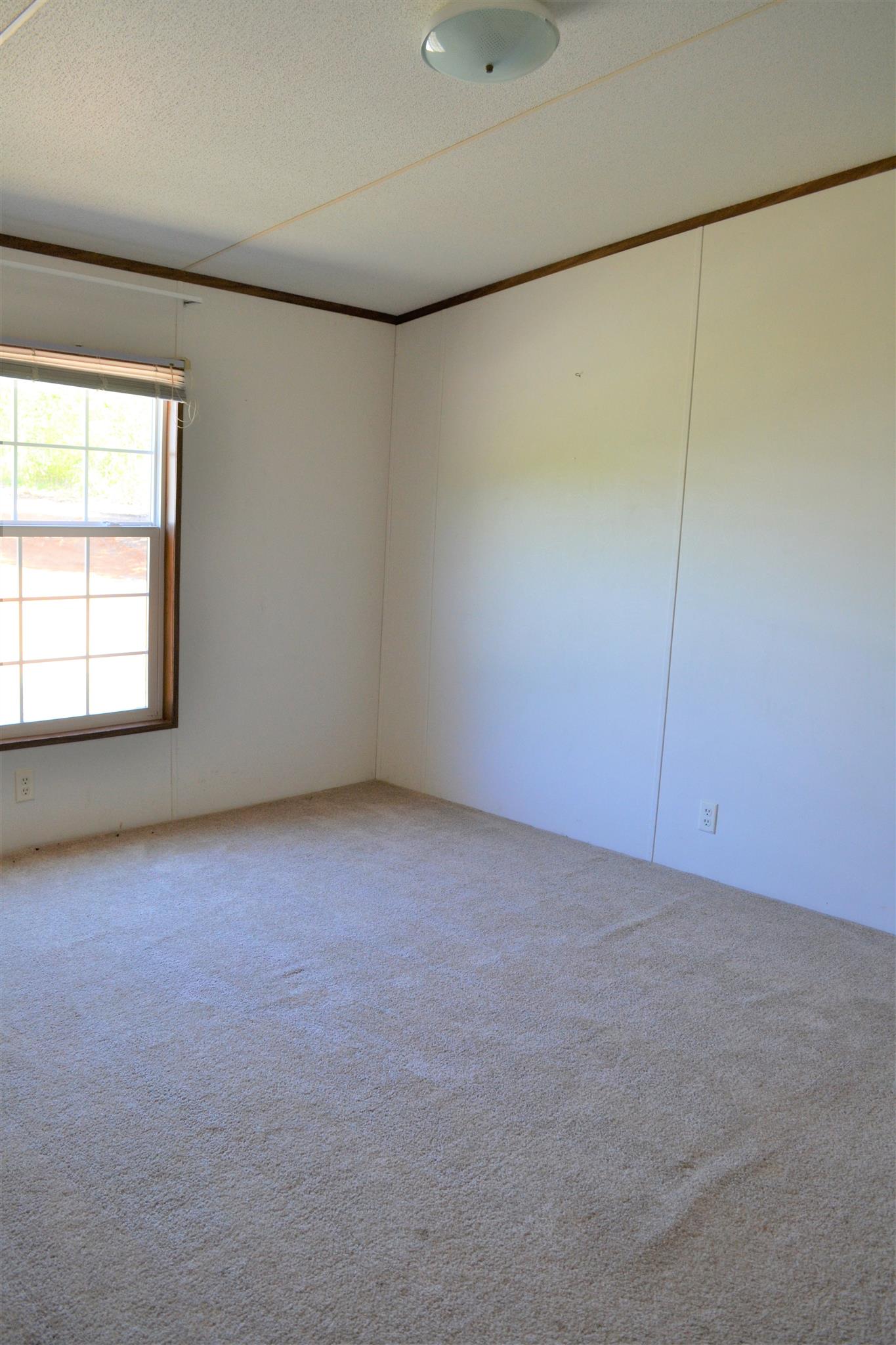 220 Knob Creek Road Lawrenceburg, TN 38464 - Photo 14 of 19 a view of an empty room with a window