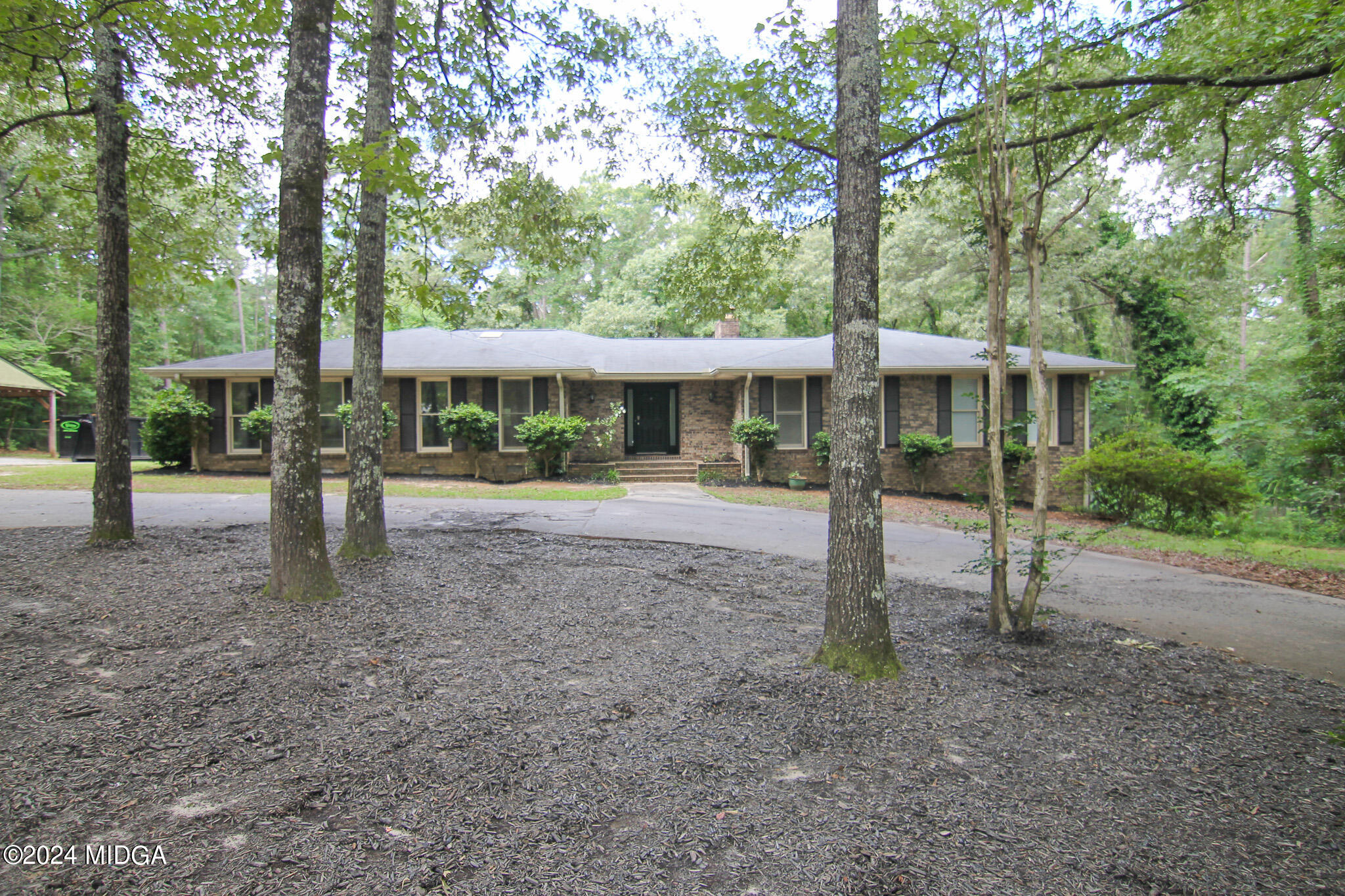 102 Nancy Place Bonaire, GA 31005 - Photo 1 of 48 a view of a park with tree s