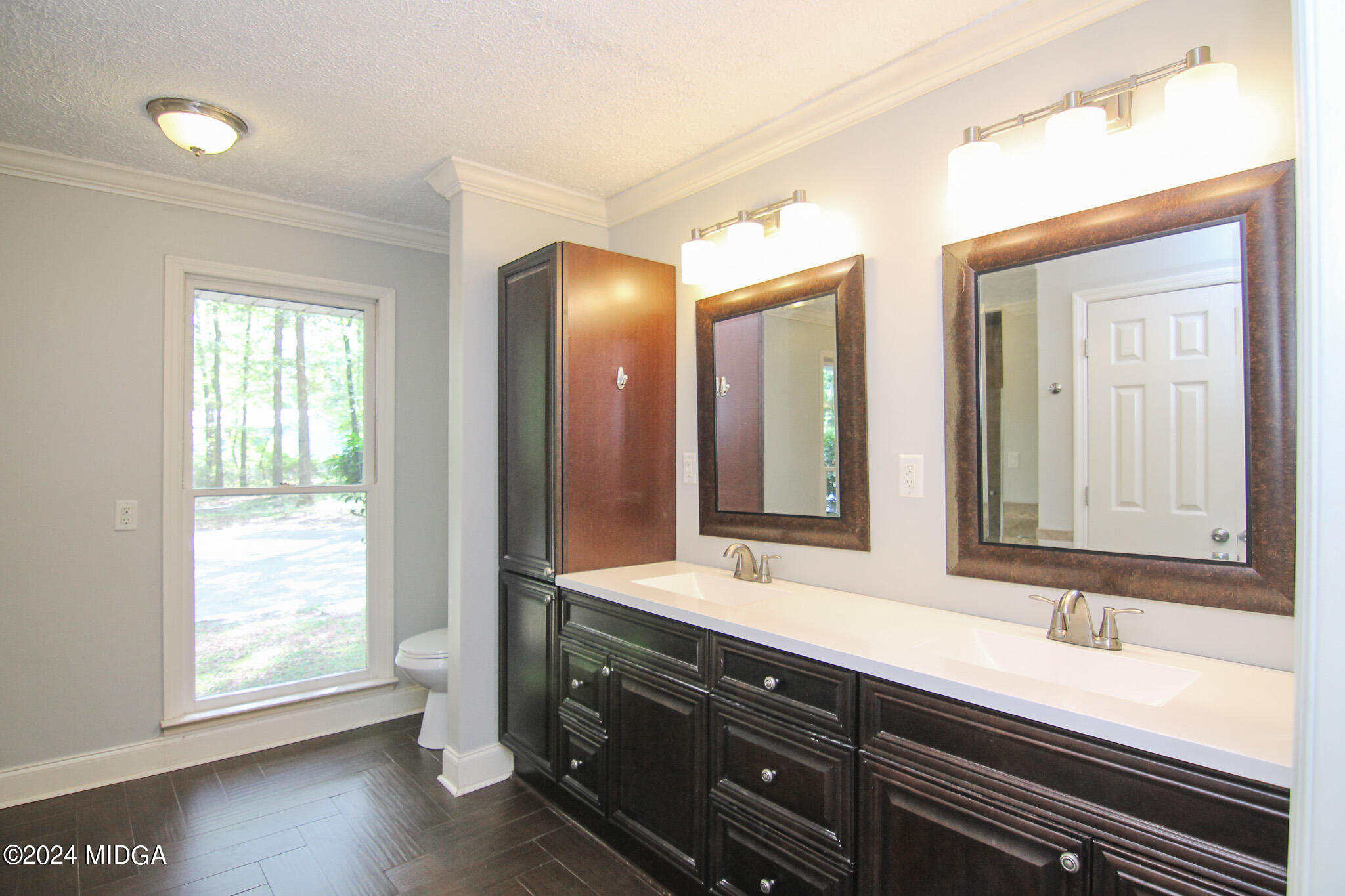 102 Nancy Place Bonaire, GA 31005 - Photo 18 of 48 a bathroom with a double vanity sink and a mirror