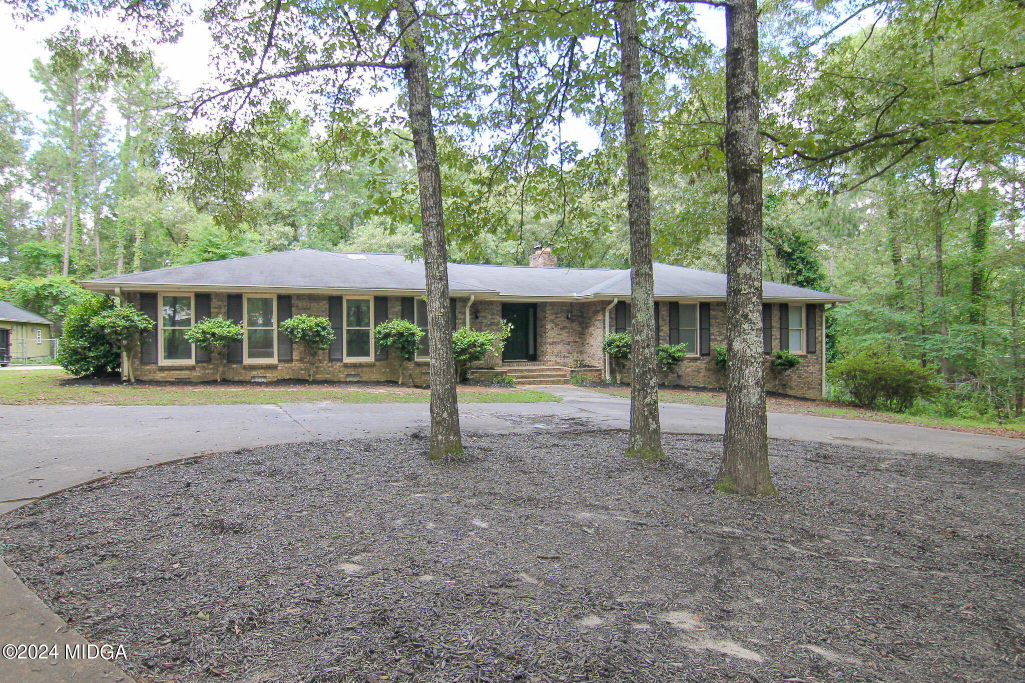 102 Nancy Place Bonaire, GA 31005 - Photo 2 of 48 a view of a house with a yard and sitting area