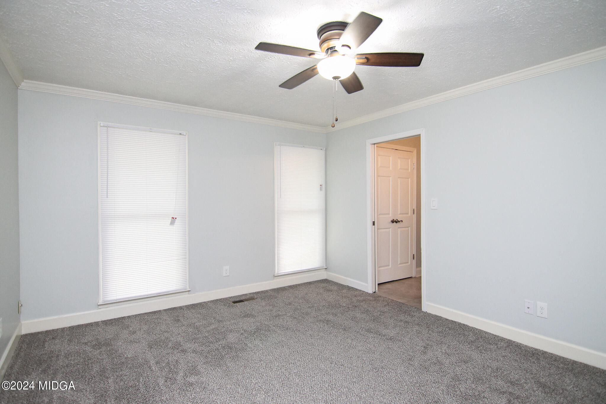 102 Nancy Place Bonaire, GA 31005 - Photo 21 of 48 a view of a big room with a ceiling fan