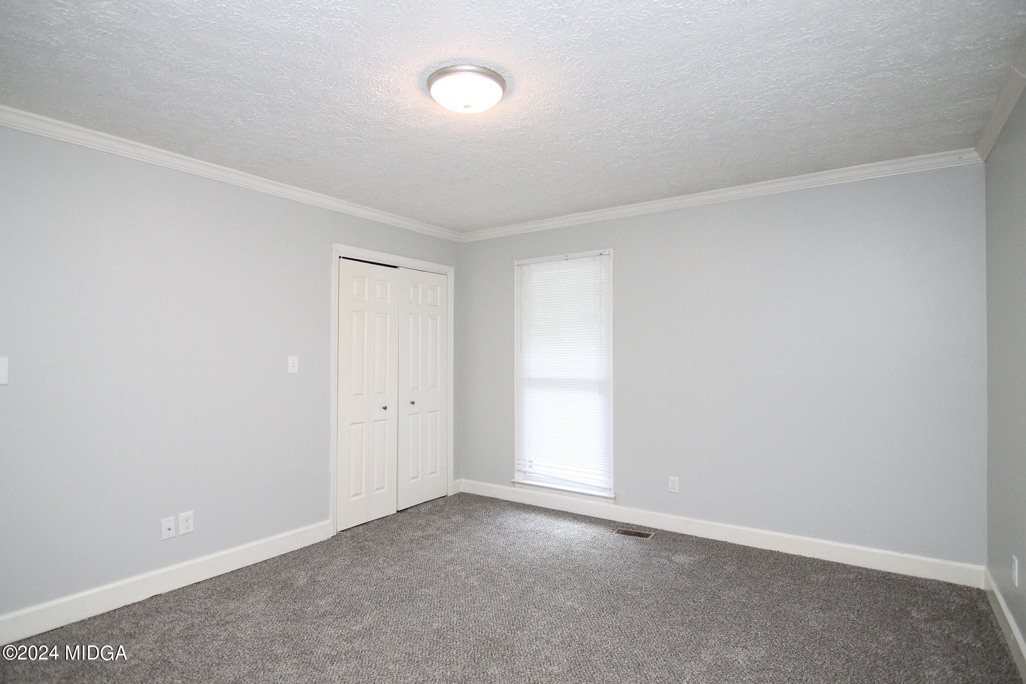 102 Nancy Place Bonaire, GA 31005 - Photo 25 of 48 a view of an empty room