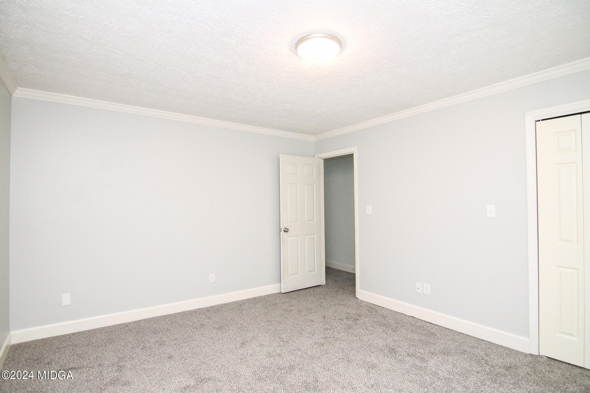 102 Nancy Place Bonaire, GA 31005 - Photo 26 of 48 a view of an empty room