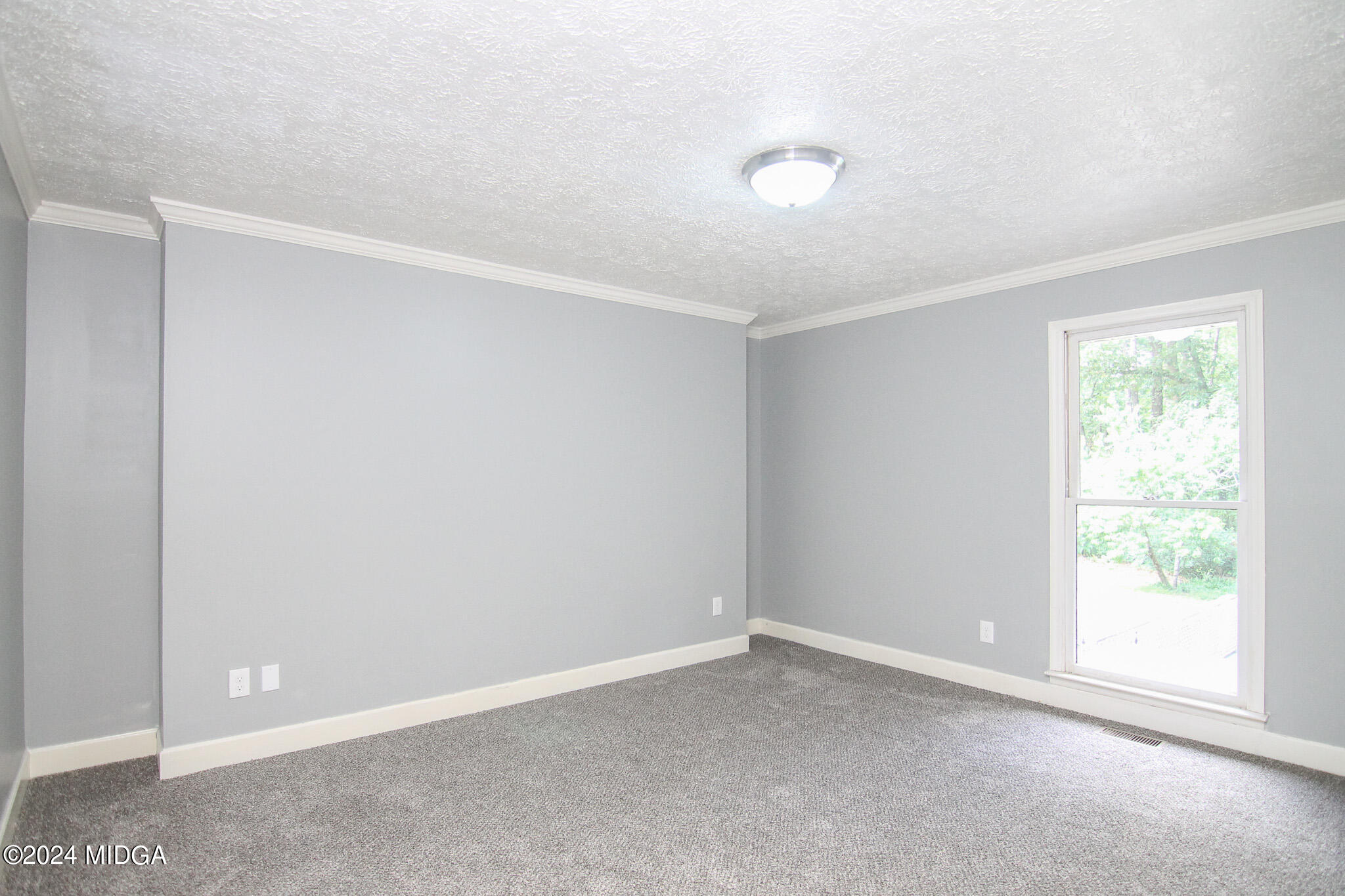 102 Nancy Place Bonaire, GA 31005 - Photo 28 of 48 a view of an empty room with a window