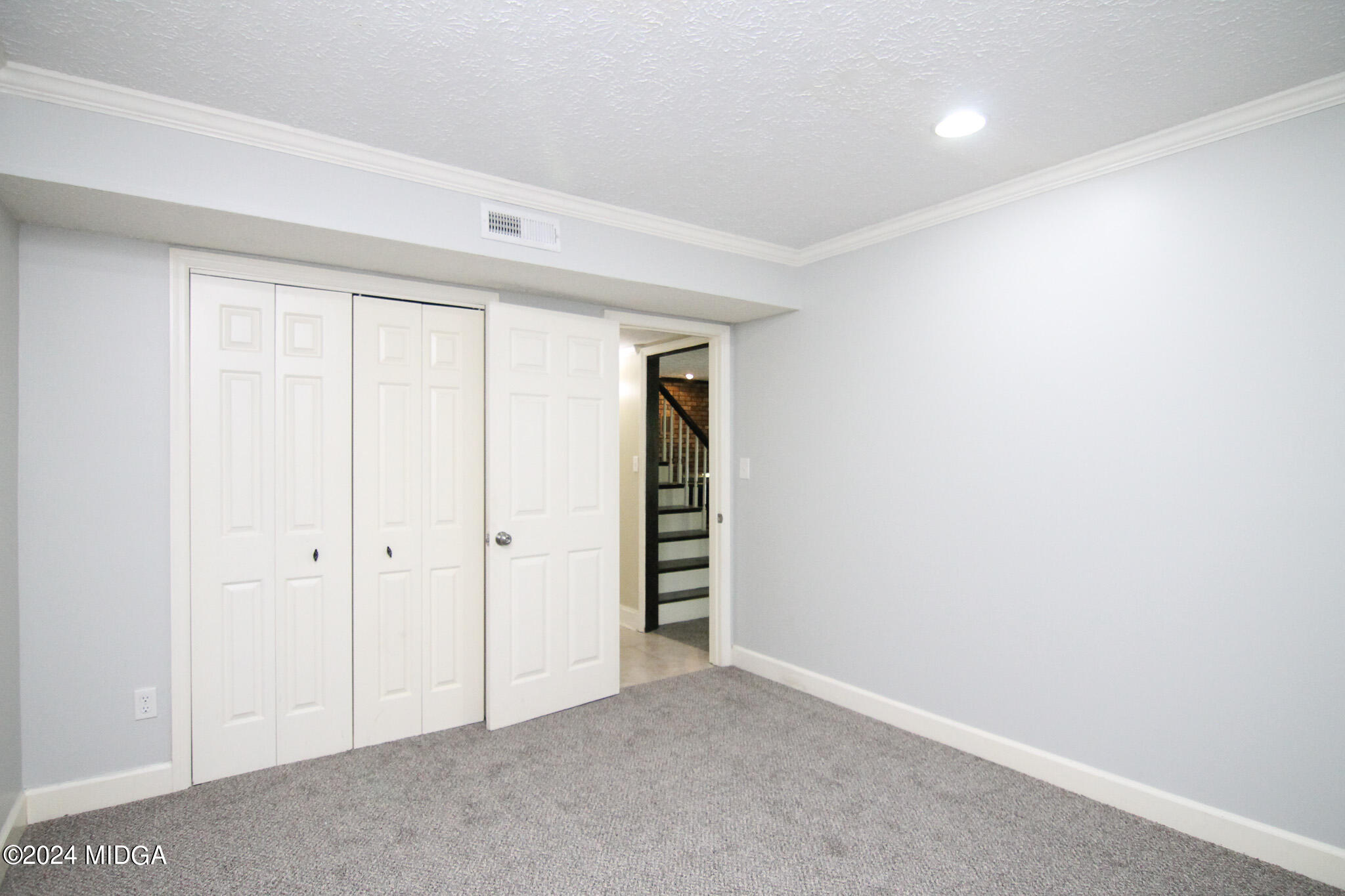 102 Nancy Place Bonaire, GA 31005 - Photo 35 of 48 an empty room with a hallway