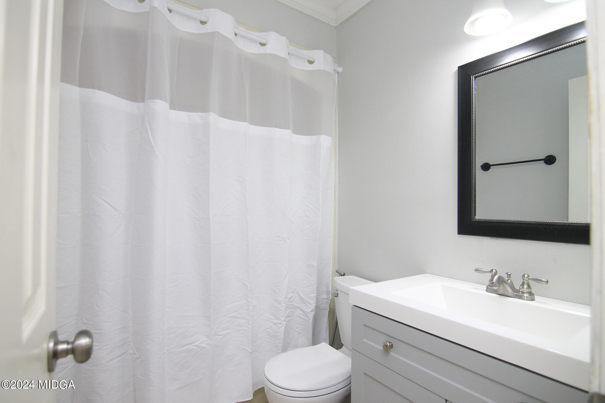 102 Nancy Place Bonaire, GA 31005 - Photo 36 of 48 a bathroom with a sink a toilet and shower