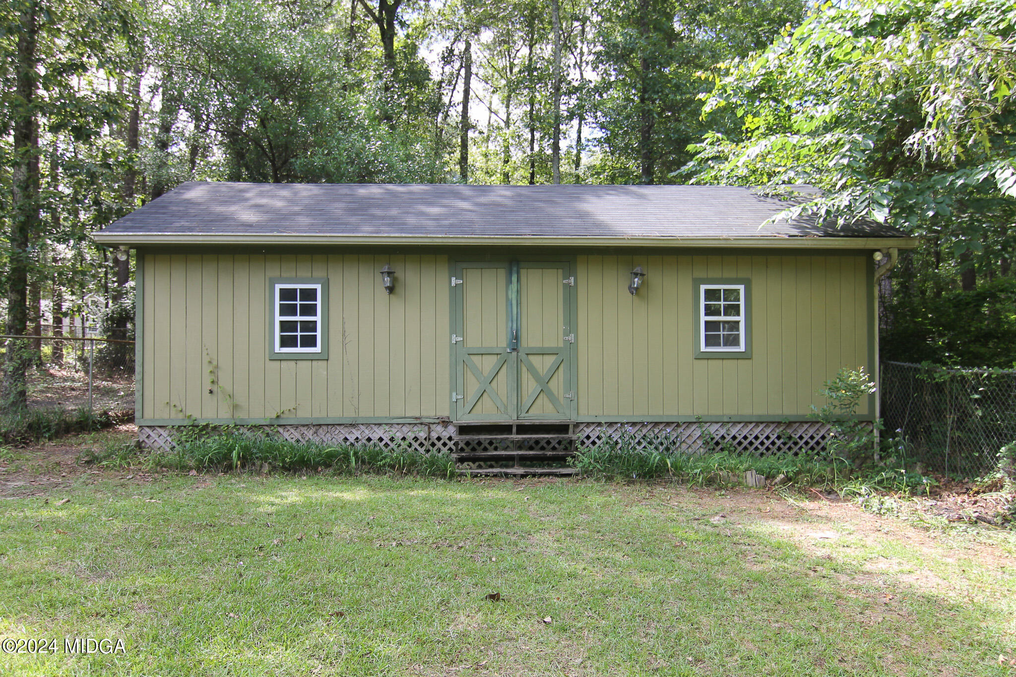 102 Nancy Place Bonaire, GA 31005 - Photo 45 of 48 a backyard of a house with lots of green space