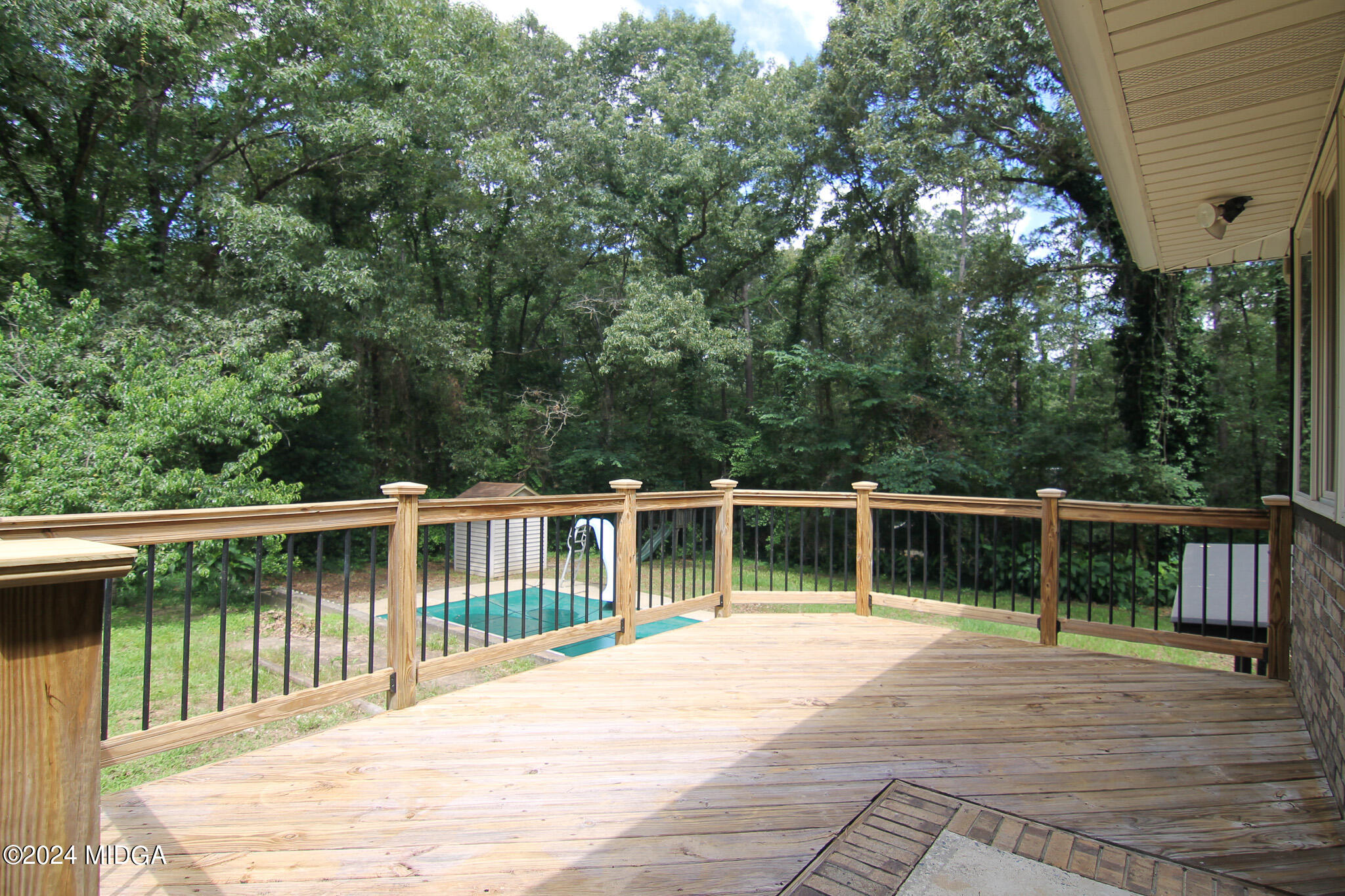102 Nancy Place Bonaire, GA 31005 - Photo 46 of 48 a view of balcony with small garden and wooden fence