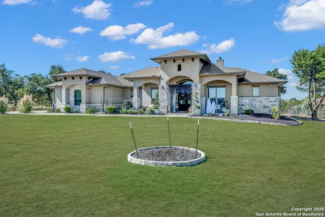 a view of a house with a big yard