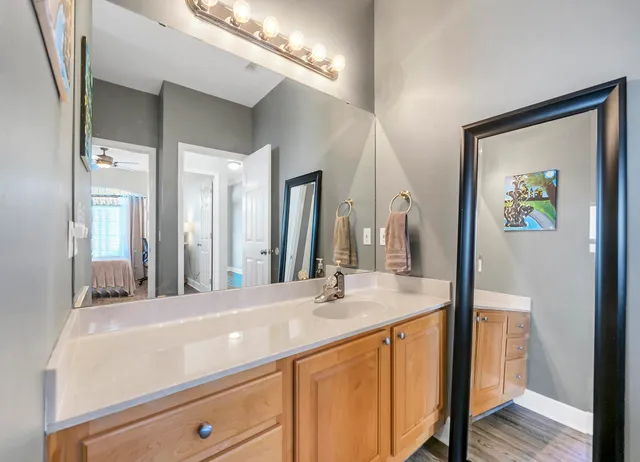 a bathroom with a sink and a mirror
