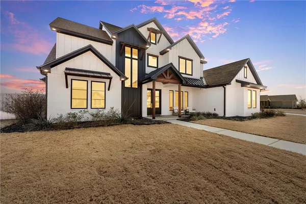front view of a house with a street