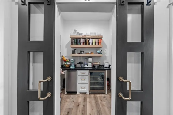 a bathroom with a double vanity sink mirror and toilet