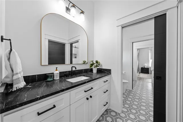 a view of a patio with a table chairs and a backyard