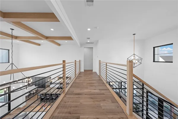 a bathroom with a granite countertop sink a toilet and a mirror
