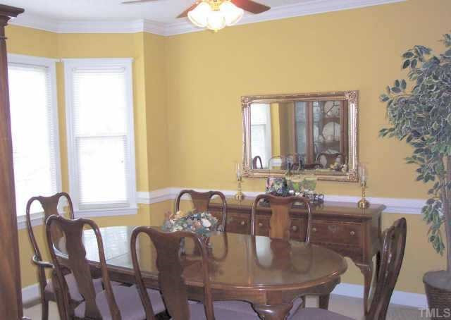 4212 Willow Lake Road Raleigh, NC 27616 - Photo 3 of 10 Formal dining room with bay window, crown molding and chair rail is a wonderful location to entertain family and friends. Other