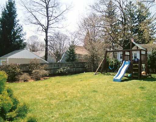 Undisclosed Address Darien, CT 06820 - Photo 3 of 8 a view of a house with a yard and sitting area