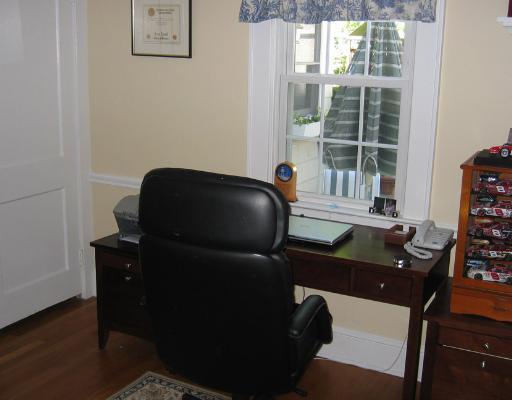 Undisclosed Address Darien, CT 06820 - Photo 7 of 8 a living room with furniture and a window
