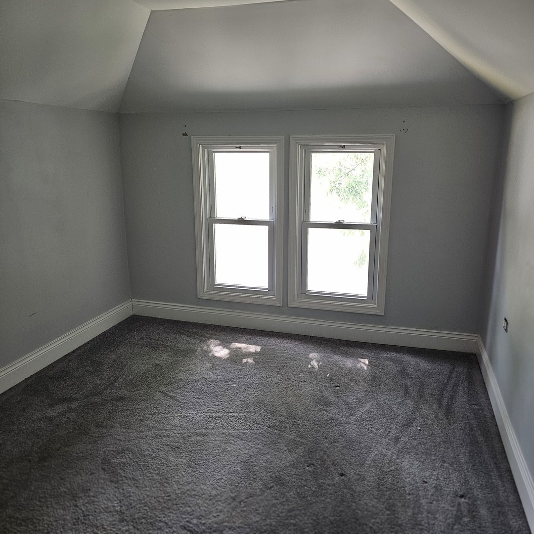 1750 183rd Street Homewood, IL 60430 - Photo 7 of 14 an empty room with windows