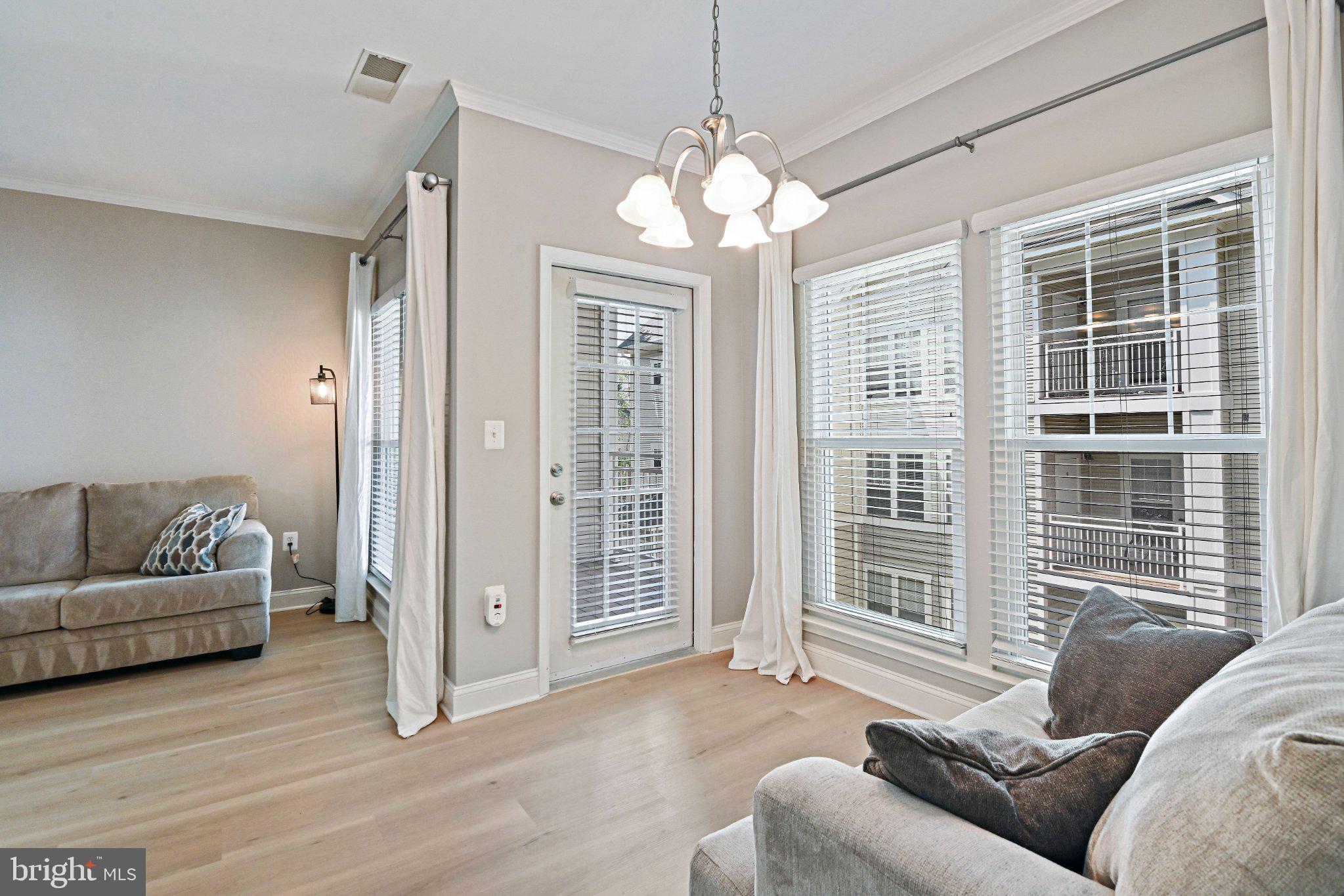 1519 North Point Drive, Unit 202 Reston, VA 20194 - Photo 14 of 49 Bright and airy living space.