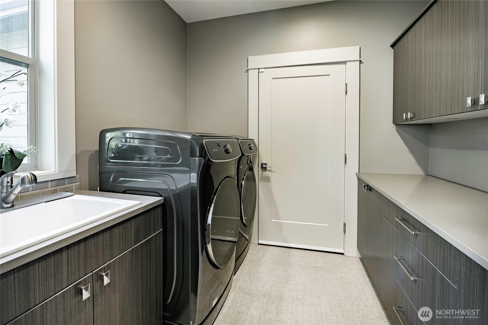 9125 Shearwater Road Blaine, WA 98230 - Photo 16 of 40 a utility room with dryer and washer