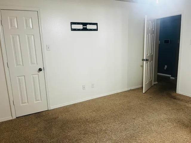 an empty room with an entryway