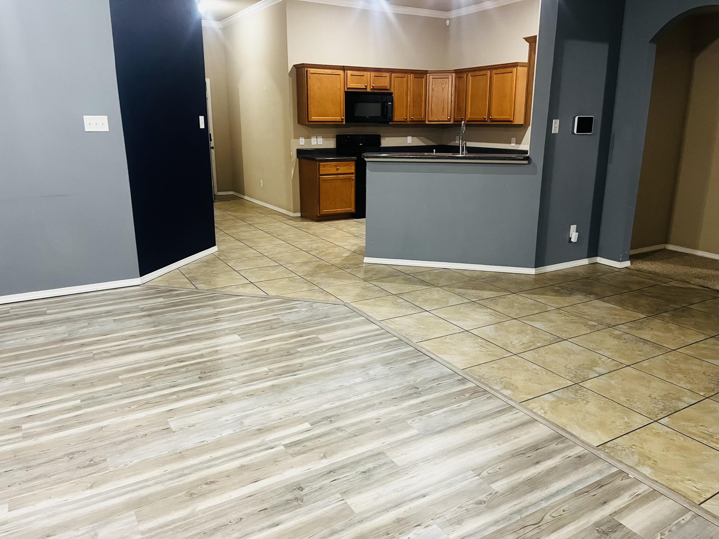 10016 Weatherford Avenue Lubbock, TX 79423 - Photo 5 of 29 a view of kitchen appliances and cabinets