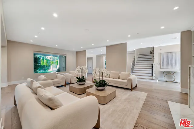 a living room with furniture and a couch