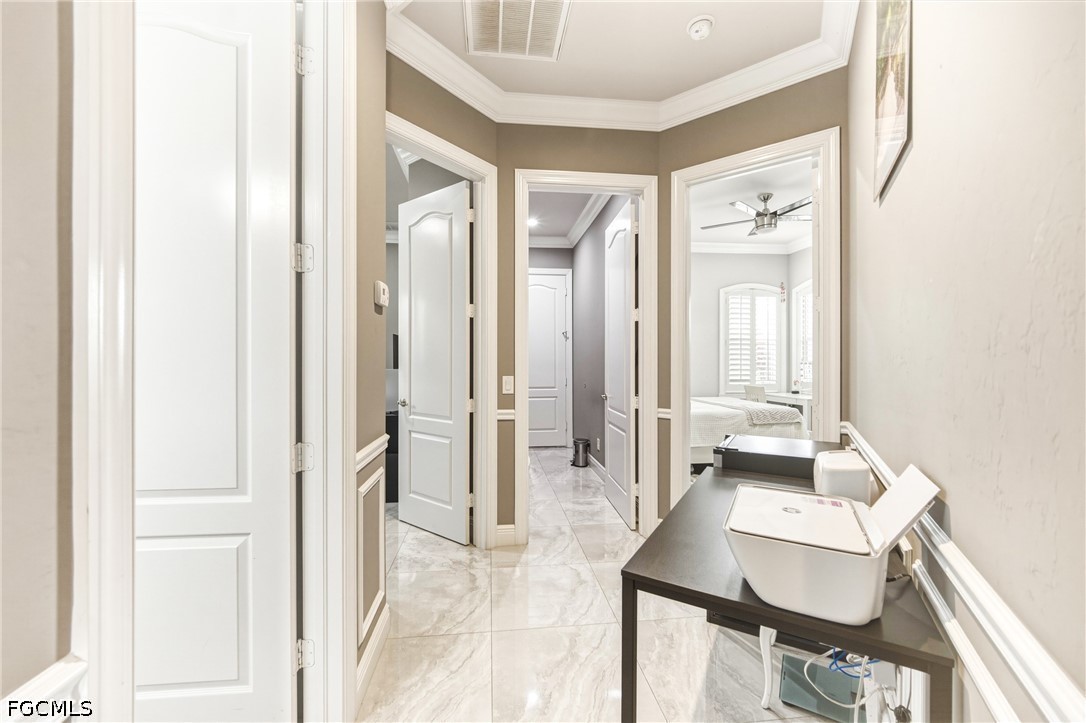 1700 43rd Terrace Southwest Naples, FL 34116 - Photo 25 of 38 a spacious bathroom with a bathtub and a sink