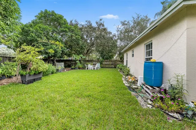a view of a backyard with a garden