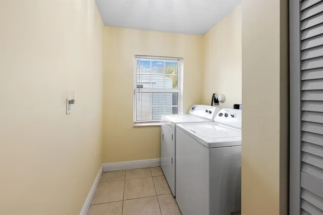 a utility room with washer and dryer