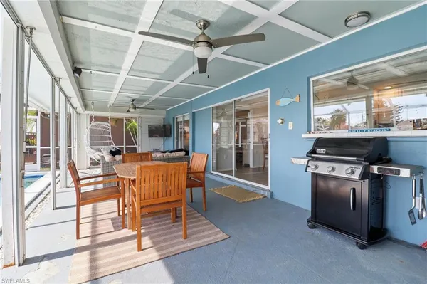 a kitchen with stainless steel appliances granite countertop a stove and a refrigerator