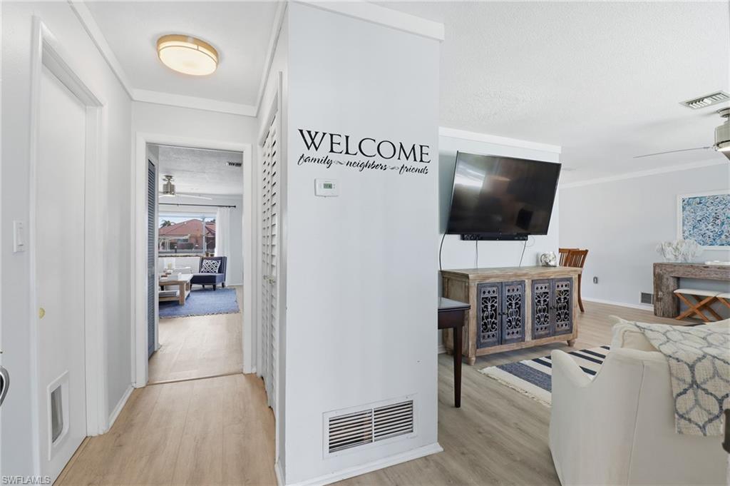 2211 Bayview Road Punta Gorda, FL 33950 - Photo 24 of 37 a view of a livingroom with furniture and flat screen tv
