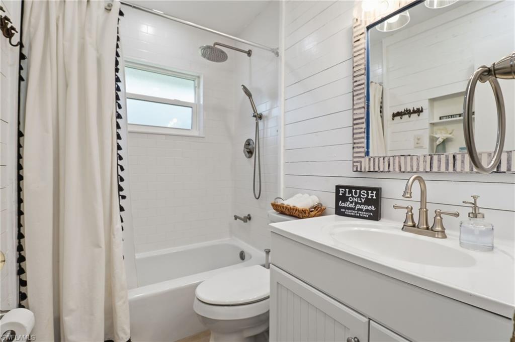 2211 Bayview Road Punta Gorda, FL 33950 - Photo 33 of 37 a bathroom with a sink a toilet and shower