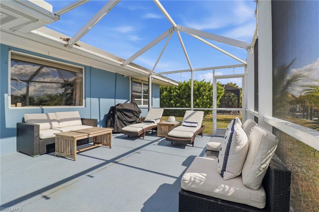 2211 Bayview Road Punta Gorda, FL 33950 - Photo 10 of 37 a living room with furniture and a large window