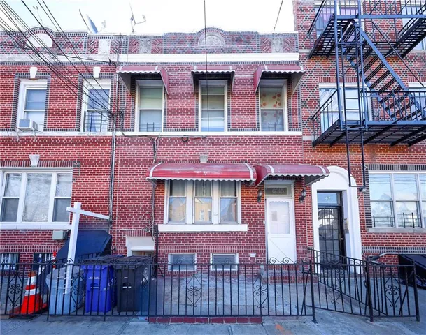 a front view of a building with glass windows