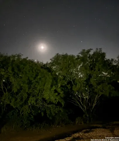 a view of lake with green space