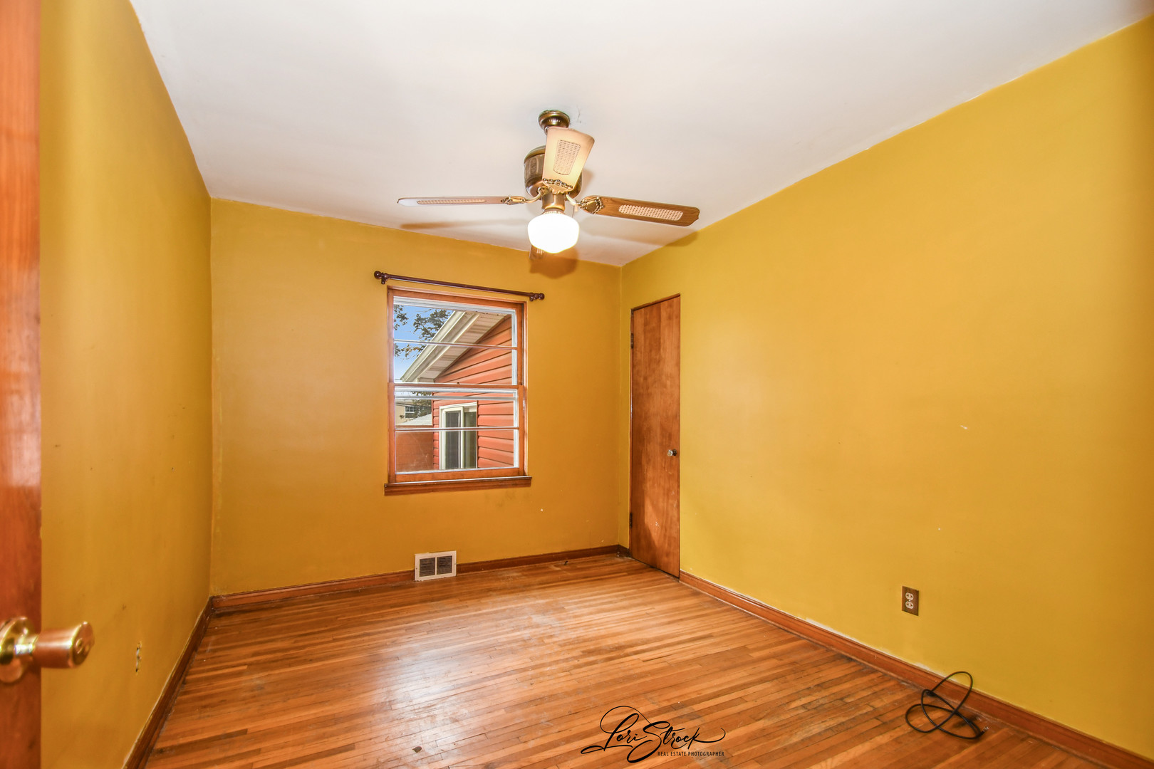 1009 Helen Avenue Joliet, IL 60433 - Photo 15 of 23 a view of an empty room with a window