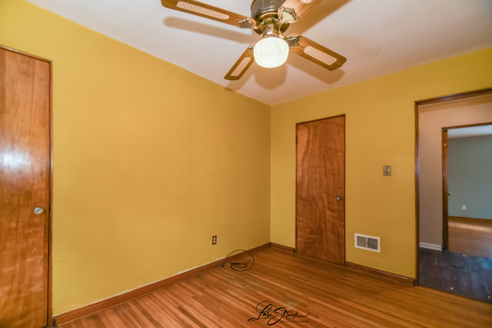 1009 Helen Avenue Joliet, IL 60433 - Photo 16 of 23 a view of an empty room with wooden floor