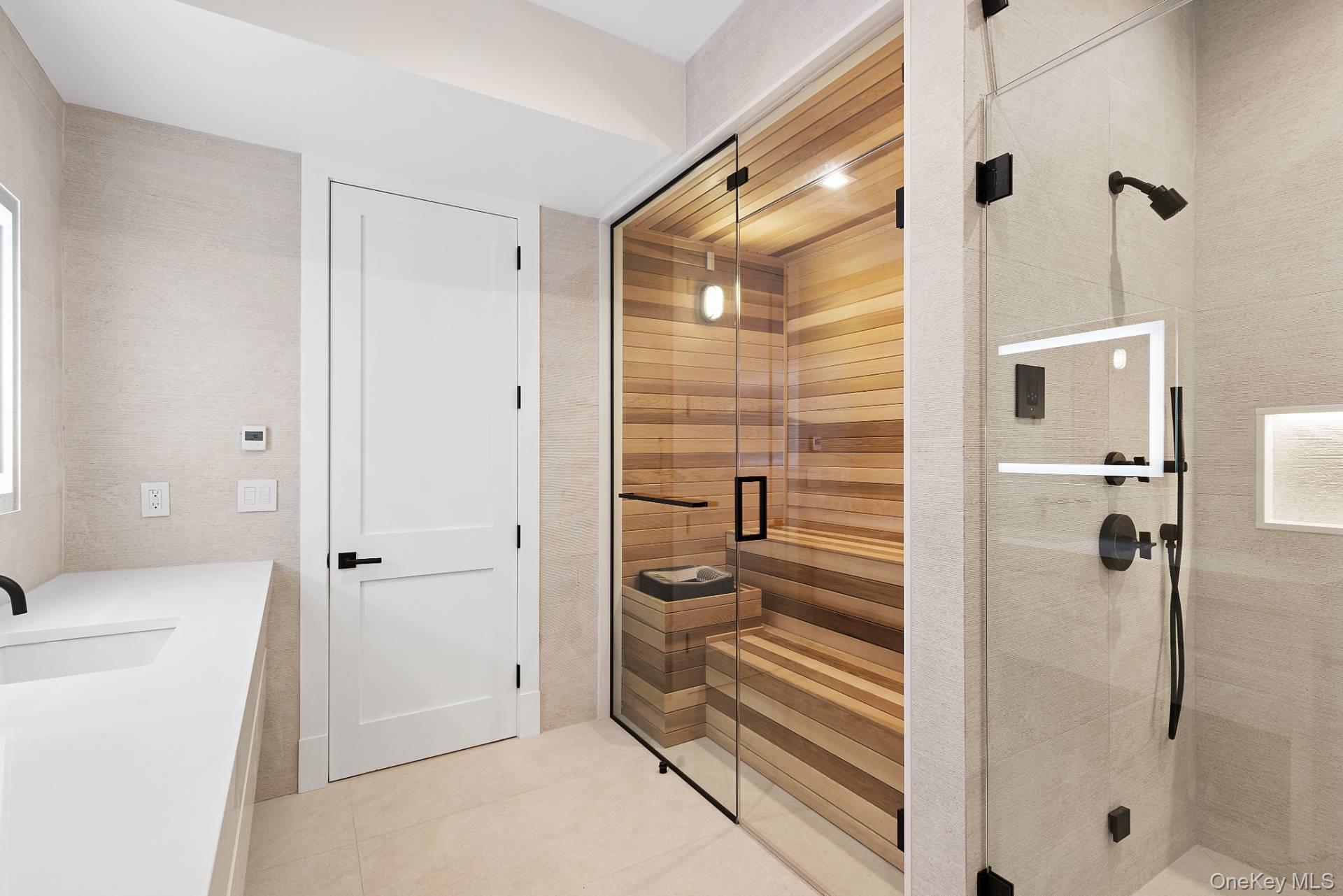 150 Edge Of Woods Road Southampton, NY 11968 - Photo 39 of 47 a bathroom with a shower and toilet