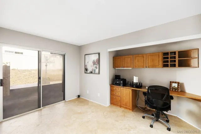 a kitchen with a sink cabinets and window