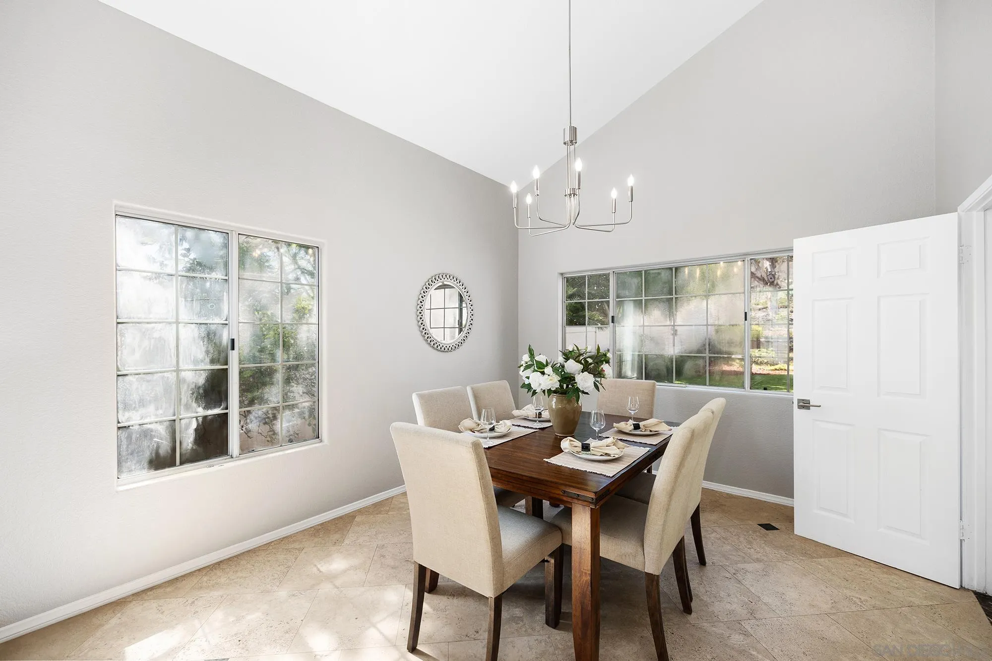 13958 Carriage Road Poway, CA 92064 - Photo 2 of 35 a view of a dining room with furniture window and outside view