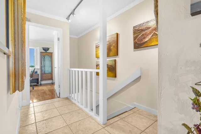 a view of a hallway view with three rooms